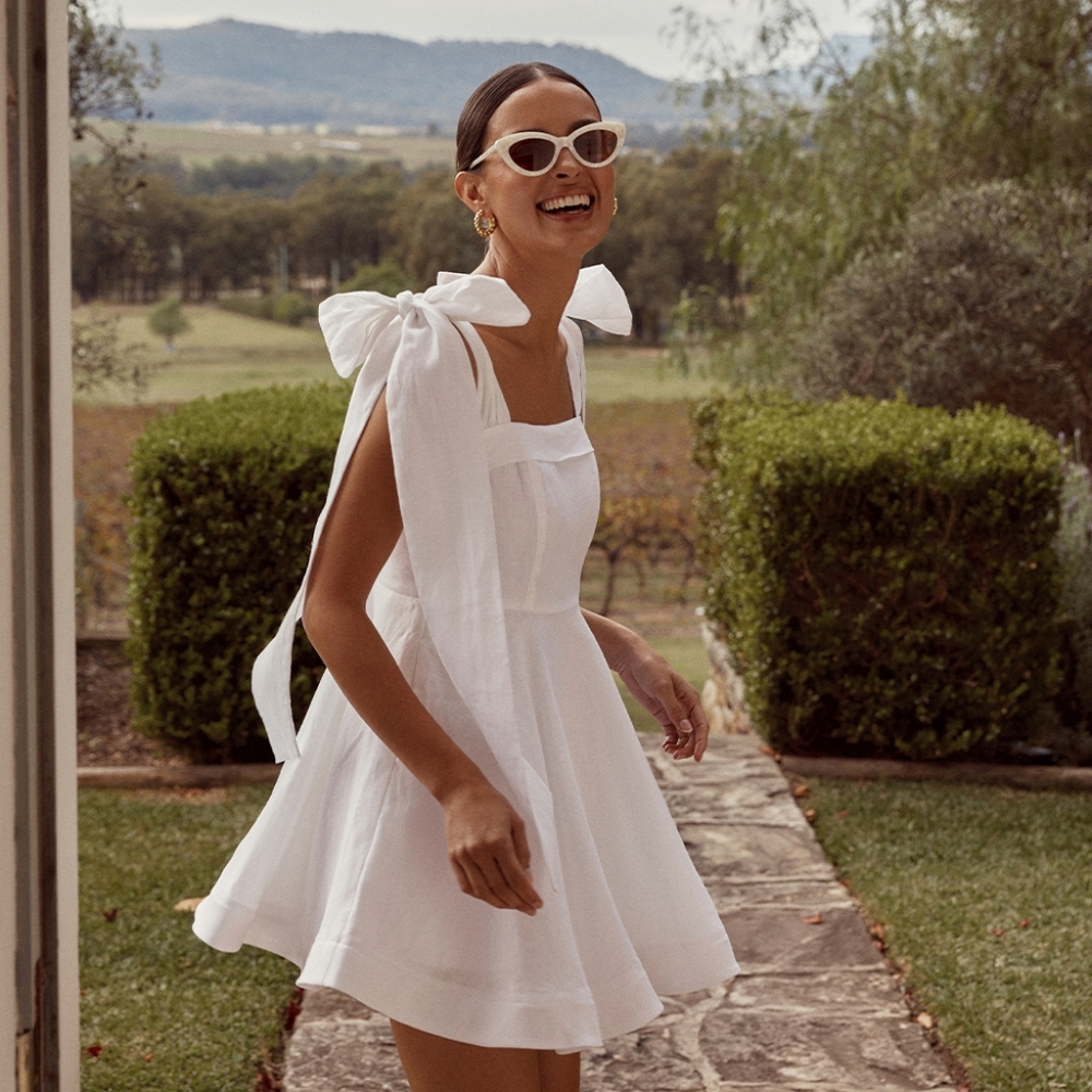 The Aisle White Linen White Bow Dress